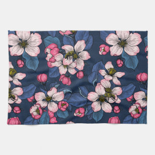 Apple blossom on a dark blue kitchen towel