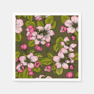 Apple blossom on dark green napkin