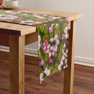 Apple blossom on dark green short table runner
