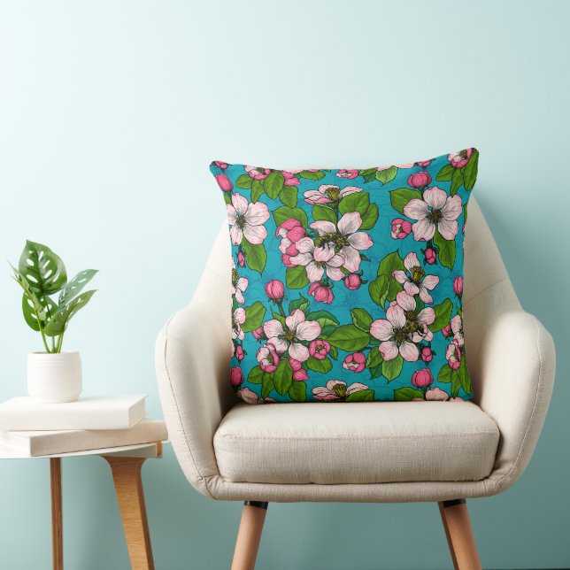 Apple blossom on turquoise throw pillow (Chair)