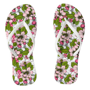 Apple blossom on white flip flops