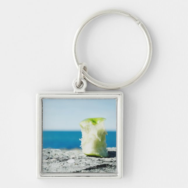 Apple core in the dirt keychain (Front)