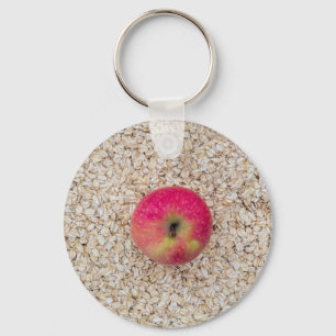 Apple on oatmeal keychain
