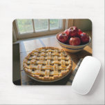 Apple Pie By a Sunny Farmhouse Window Mouse Pad<br><div class="desc">A baked apple pie,  adorned with a beautiful lattice crust and charming star designs,  resting invitingly on a wooden table beside a sunlit farmhouse window</div>