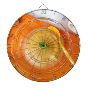 Applesauce with cinnamon and orange spoon dartboard