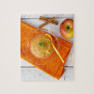 Applesauce with cinnamon and orange spoon jigsaw puzzle