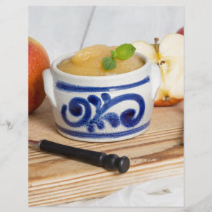 Applesauce with cinnamon in stoneware bowl