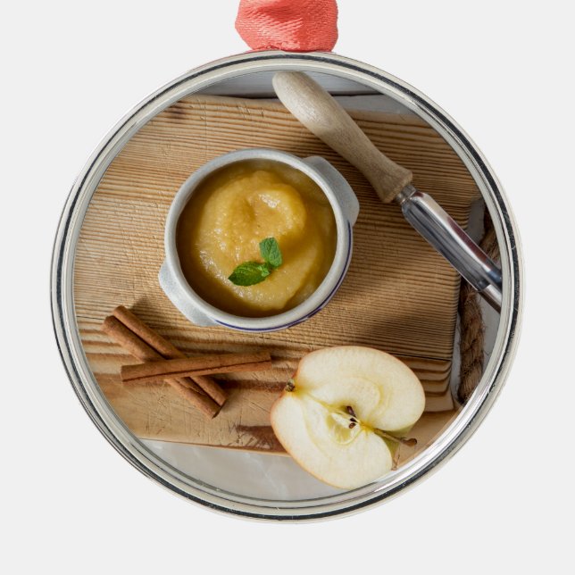 Applesauce with cinnamon in stoneware bowl metal ornament (Front)