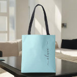 Aqua Blue Teal Girly Script Monogram Modern Tote Bag<br><div class="desc">Aqua Blue Teal Elegant Add Your Own Name Monogram Book Bag. This Book Bag can be customized to include your initial and first name and given as a gift for Christmas,  Sweet 16 Birthday,  Bridal Shower or a Wedding.</div>