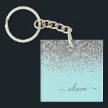 Aqua Blue Teal Silver Glitter Monogram Keychain<br><div class="desc">Aqua Blue - Teal and Silver Faux Foil Sparkle Glitter Script Monogram Name Keychain. This makes the perfect sweet 16 birthday,  wedding,  bridal shower,  anniversary,  baby shower or bachelorette party gift for someone that loves glam luxury and chic styles.</div>