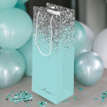 Aqua Blue Teal Silver Glitter Monogram Wine Gift Bag<br><div class="desc">Aqua Blue - Teal and Silver Sparkle Glitter Script Monogram Name Gift Bag. This makes the perfect sweet 16 birthday,  wedding,  bridal shower,  anniversary,  baby shower or bachelorette party gift bag for someone that loves glam luxury and chic styles.</div>