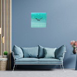 Aquamarine green and blue calm ocean square wall clock<br><div class="desc">Abstract pattern of aquamarine,  turquoise coloured sea water with soft and pale green and bit of  blue. Clock face with white letters.
Photo of the Mediterranean Ocean.</div>