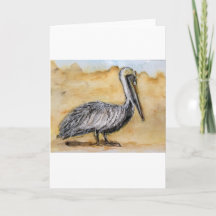 Aquarelle d'un pélican sur une carte de vœux pliée