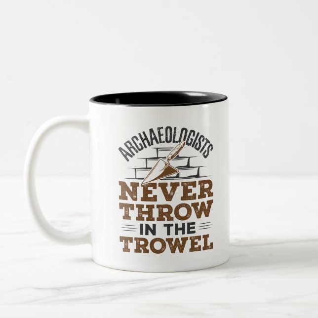 Archaeologists Never Throw In the Trowel Two-Tone Coffee Mug (Left)