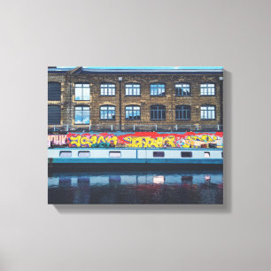 architectural photography of brown building canvas print