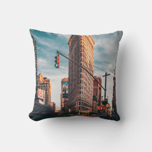 ARCHITECTURAL PHOTOGRAPHY OF BROWN BUILDING THROW PILLOW