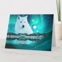 Arctic wolf and magical night with northern lights