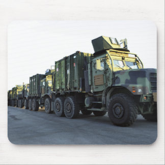 Armoured trucks sit on the pier at Morehead City Mouse Pad