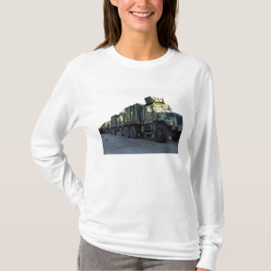 Armoured trucks sit on the pier at Morehead City T-Shirt