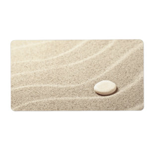 Arrière - plan de sable avec la pierre blanche