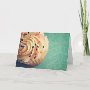 Arrose la carte de voeux de petit gâteau