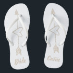 Arrow Heart Brides Wedding Flip Flops<br><div class="desc">White bride's flip flops with graphics of a champagne glitter looking heart outline,  with an arrow going through it.  Custom tan text is fully customizable to suit your needs.</div>