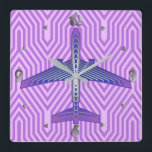 Art Deco Airplane, Violet Purple and Silver Grey Square Wall Clock<br><div class="desc">Clock in an Art Deco inspired concept of a futuristic plane,  in a striped,  silky gradient of lilac to deep violet purple,  with bands of silver grey / grey,  on a pastel lilac and orchid,  Deco background</div>
