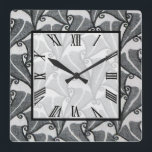 Art Deco Leaves Square Wall Clock<br><div class="desc">10.75” x 10.75” acrylic wall clock with an image of a gorgeous Art Deco black and white leaf design. The white transparent square has a Roman numeral clock face and a black border. See the entire Roaring 20s Clock collection in the DECOR | Clocks section.</div>