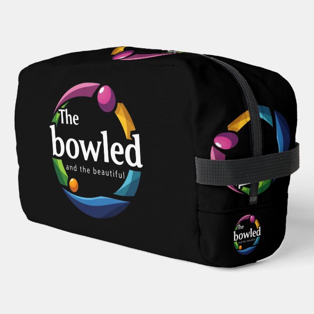 "Art in Motion: Circular Lawn Bowls Bowled Logo, Dopp Kit (Left Corner)
