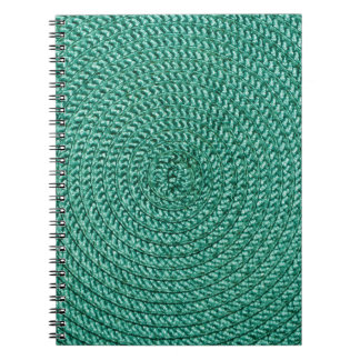 Artificial braided green fabric texture. notebook