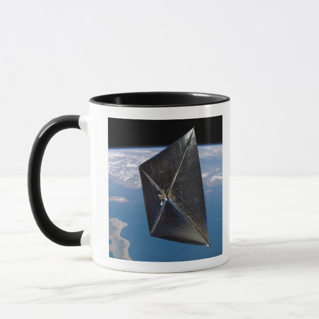 Artist concept of NanoSail-D in space Mug (Left)