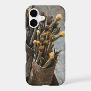 Artist Paintbrushes in Old Rusty Tin Cans