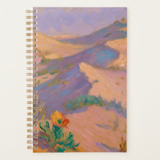 Artistic spiral notebook with desert drawings planner