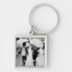Asia, Japan, Tokyo. Young women and umbrellas. Keychain