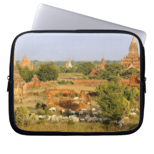 Asia, Myanmar (Burma), Bagan (Pagan). Cows pass Laptop Sleeve