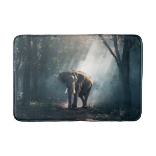 Asian Elephant in a Sunlit Forest Clearing Bath Mat