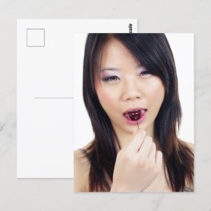Asian fashion woman with cherry lips postcard