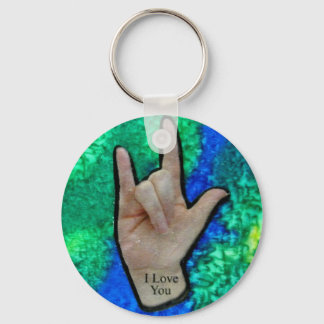 asl I love you keychain on painted silk background