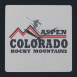 Aspen Colorado ski resort Square Wall Clock<br><div class="desc">Begin your fantastic trip to Aspen Colorado and Rocky Mountains National Park with this original and unique graphic design that is a perfect gift idea for men, women, and kids to hike and enjoy the great outdoor winter views. You're about to experience some of the best scenery in America. This...</div>