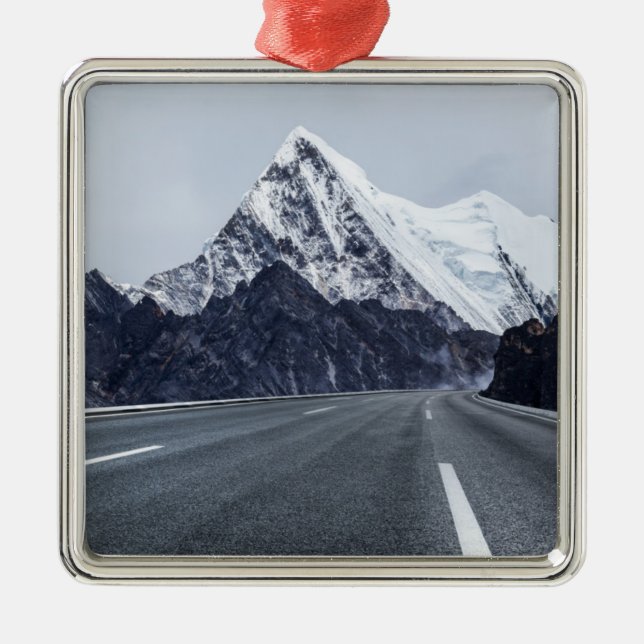 Asphalt Road in front of Snow Mountain Metal Ornament (Front)