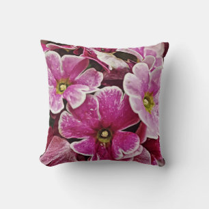 Assez dans le coussin rose de primevère