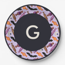 Bonbons d'Halloween traite le monogramme pourpre