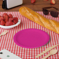 Papier d'emballage à pois rouge et rose avec unifo
