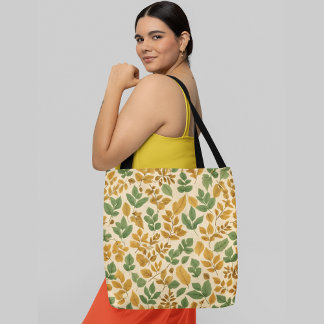 Assorted green and yellow leaves tote bag