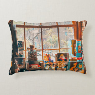 ASSORTED PLUSH TOYS ON BROWN WOODEN SHELF ACCENT PILLOW
