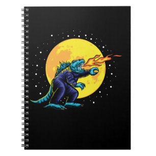 astro godzilla illustration with design notebook