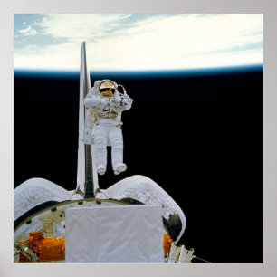 Astronaut Floating above Shuttle Discovery Poster