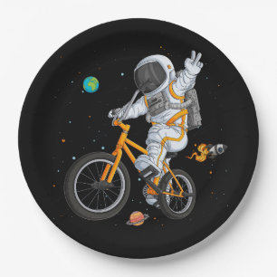 astronaut in spacesuit riding bmx bike on space ov paper plate