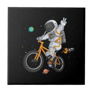 astronaut in spacesuit riding bmx bike on space ov tile