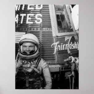 Astronaut John Glenn poses beside Friendship 7 Poster